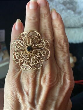 Elegant Gold Filigree Floral Ring with Black Center